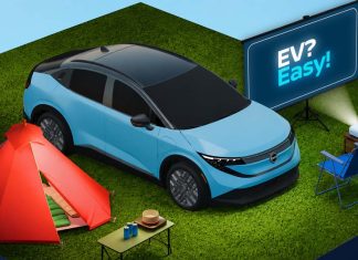 Série da Nissan explica os segredos da mobilidade elétrica Nissan EV elétrico junto a tenda e equipamento de lazer na série da Nissan EV? Easy!